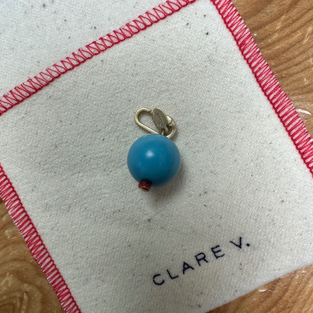 Clare V. Charm